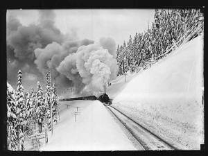 Steam locomotive in snow.